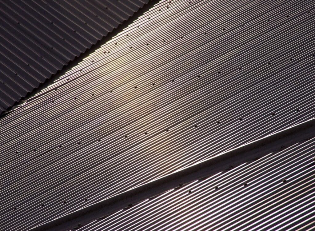 steel roof with exposed screws for cost to replace roof