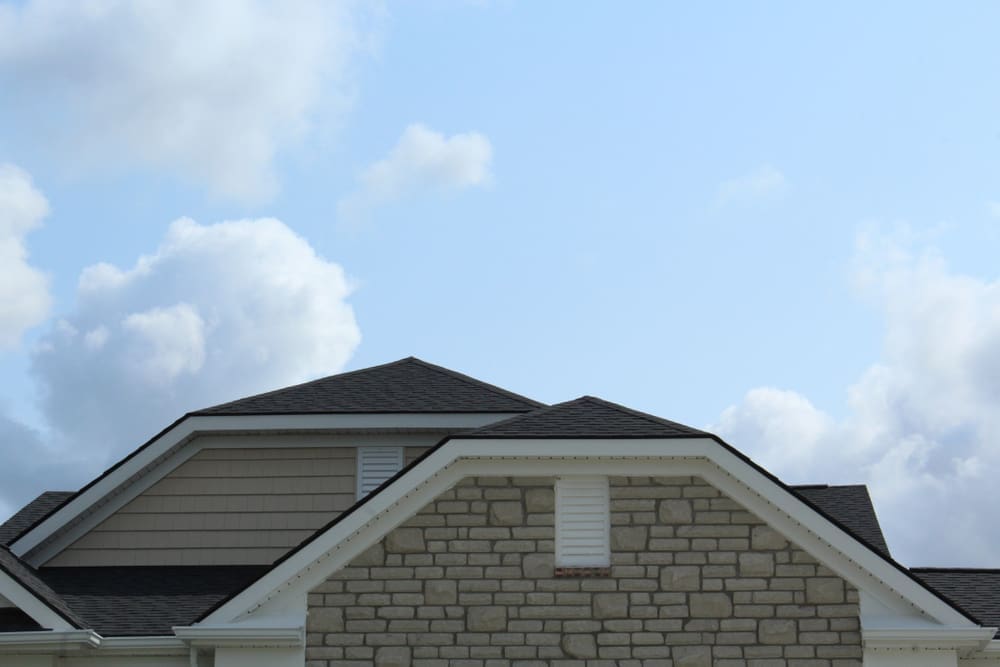 The clipped gable roof design, also known as a jerkinhead or hipped gable roof, is a unique and visually intriguing style that combines elements of both gable and hip roof designs.